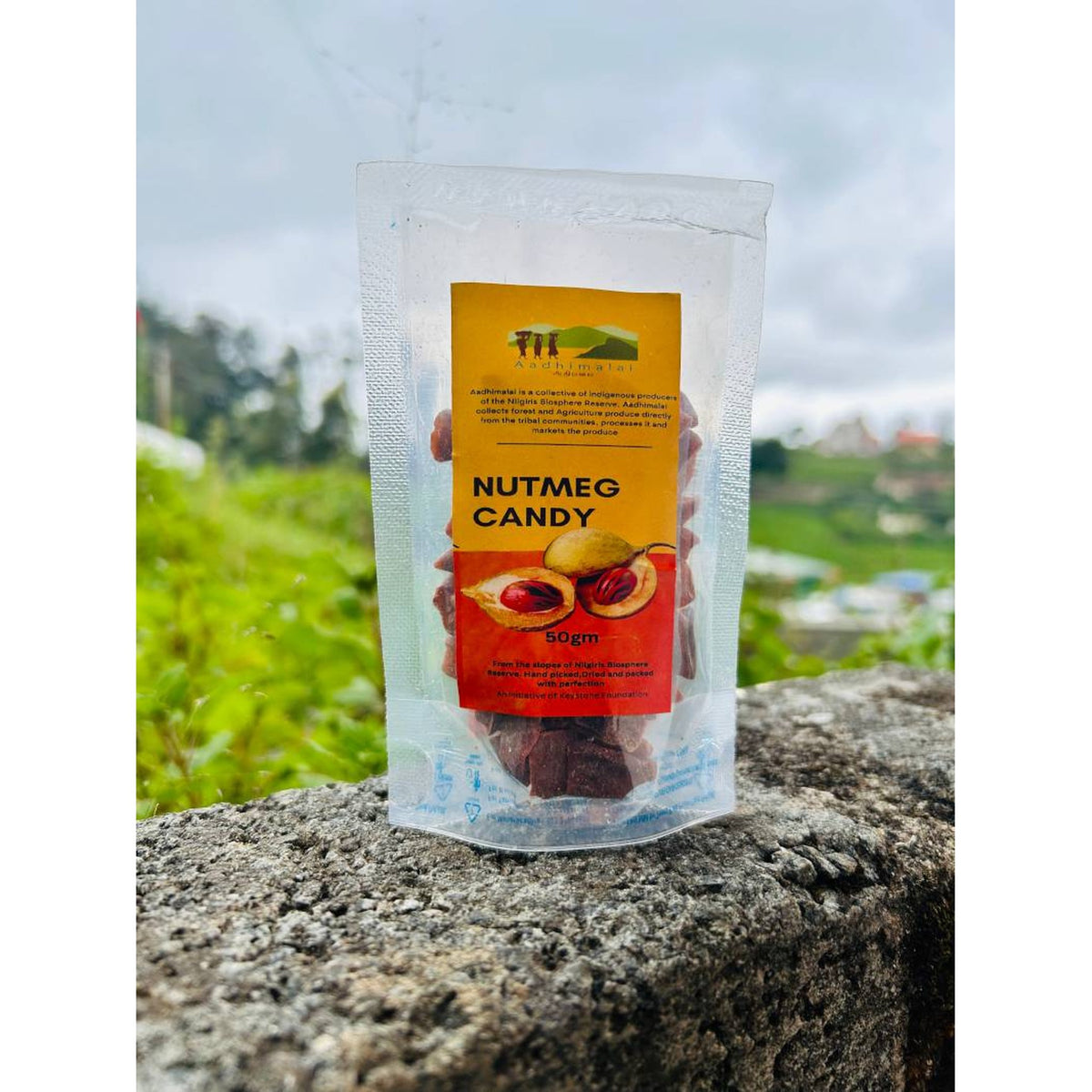 Aadhimalai Nutmeg Candy pouch photographed outdoors in the Nilgiris