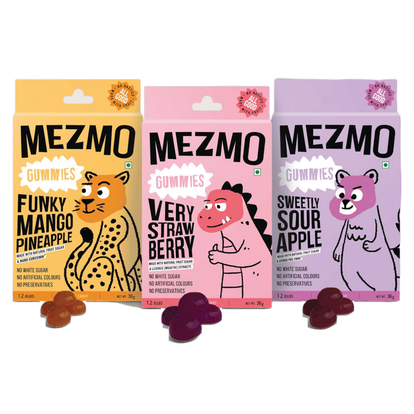 Mezmo Fruit Gummies in three flavours - funky mango pineapple, very strawberry and sweetly sour apple - with loose gummies at the base, on a plain white background