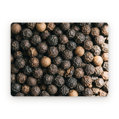 Whole black peppercorns, close up