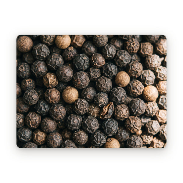 Whole black peppercorns, close up