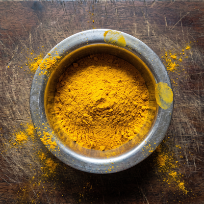 Turmeric powder in a steel katori