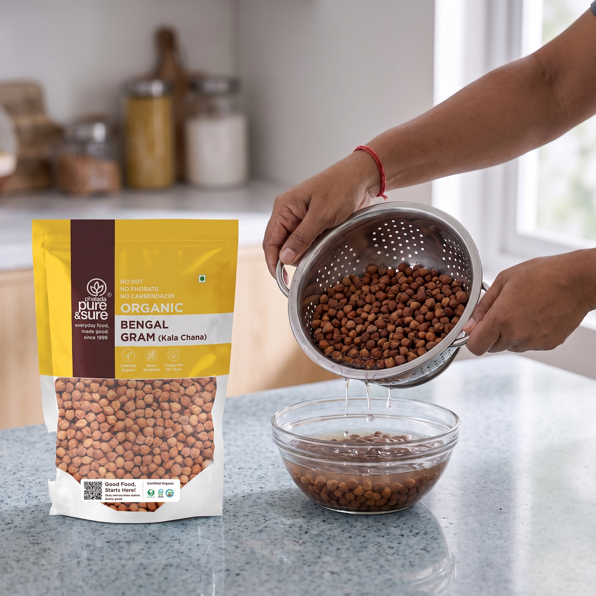 Tipping soaked kala chana from a colander