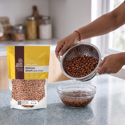 Tipping soaked kala chana from a colander