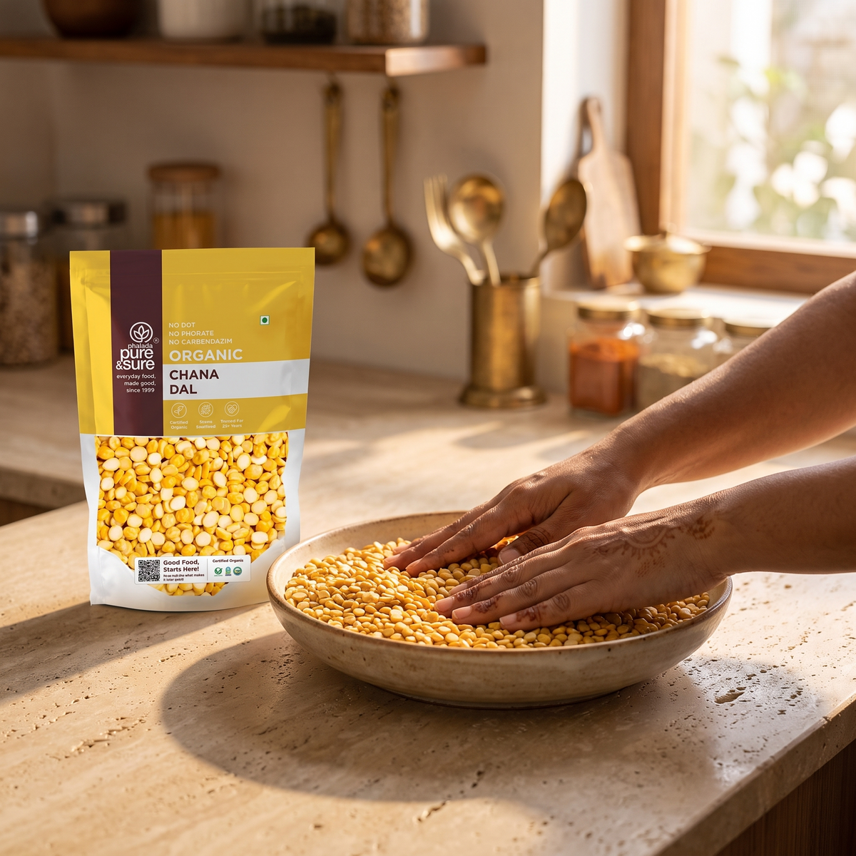 Running fingers through a bowl of chana dal