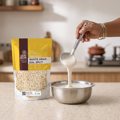 Spooning ground urad batter