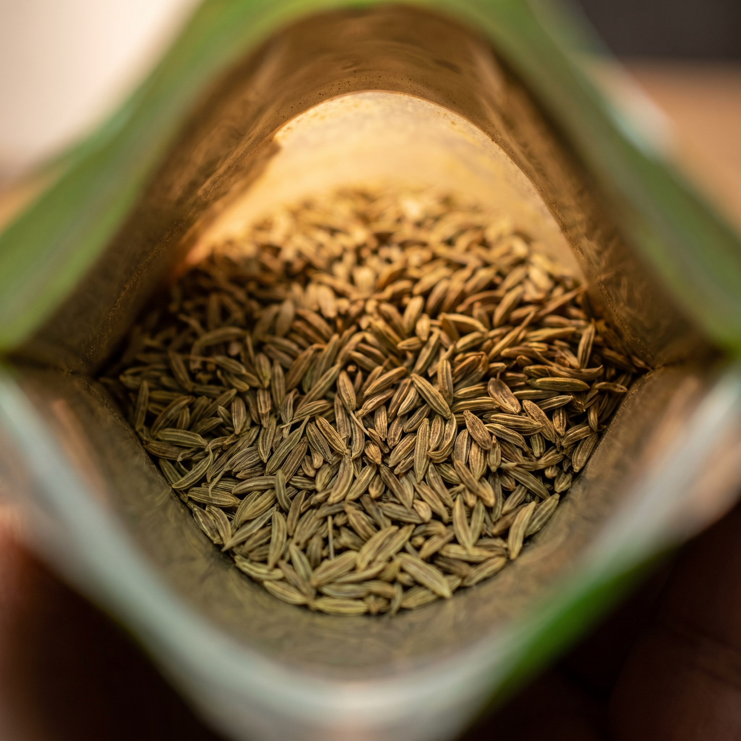 Looking into the pack at whole cumin seed