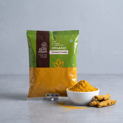 Pack with a bowl of turmeric powder and dried turmeric fingers