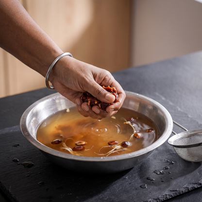 Tamarind soaked and squeezed in warm water before straining