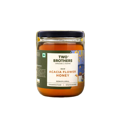 Two Brothers raw acacia flower honey jar on a plain background