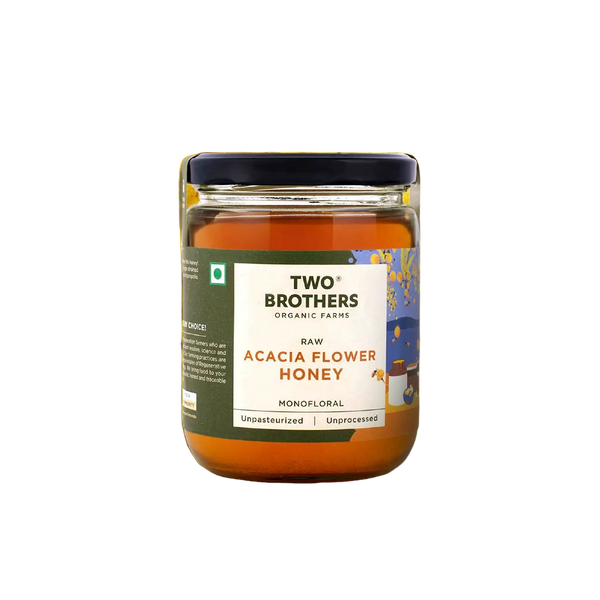 Two Brothers raw acacia flower honey jar on a plain background