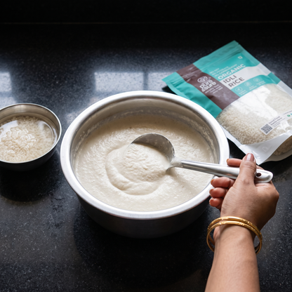 Preparing idli batter with the idli rice pack alongside
