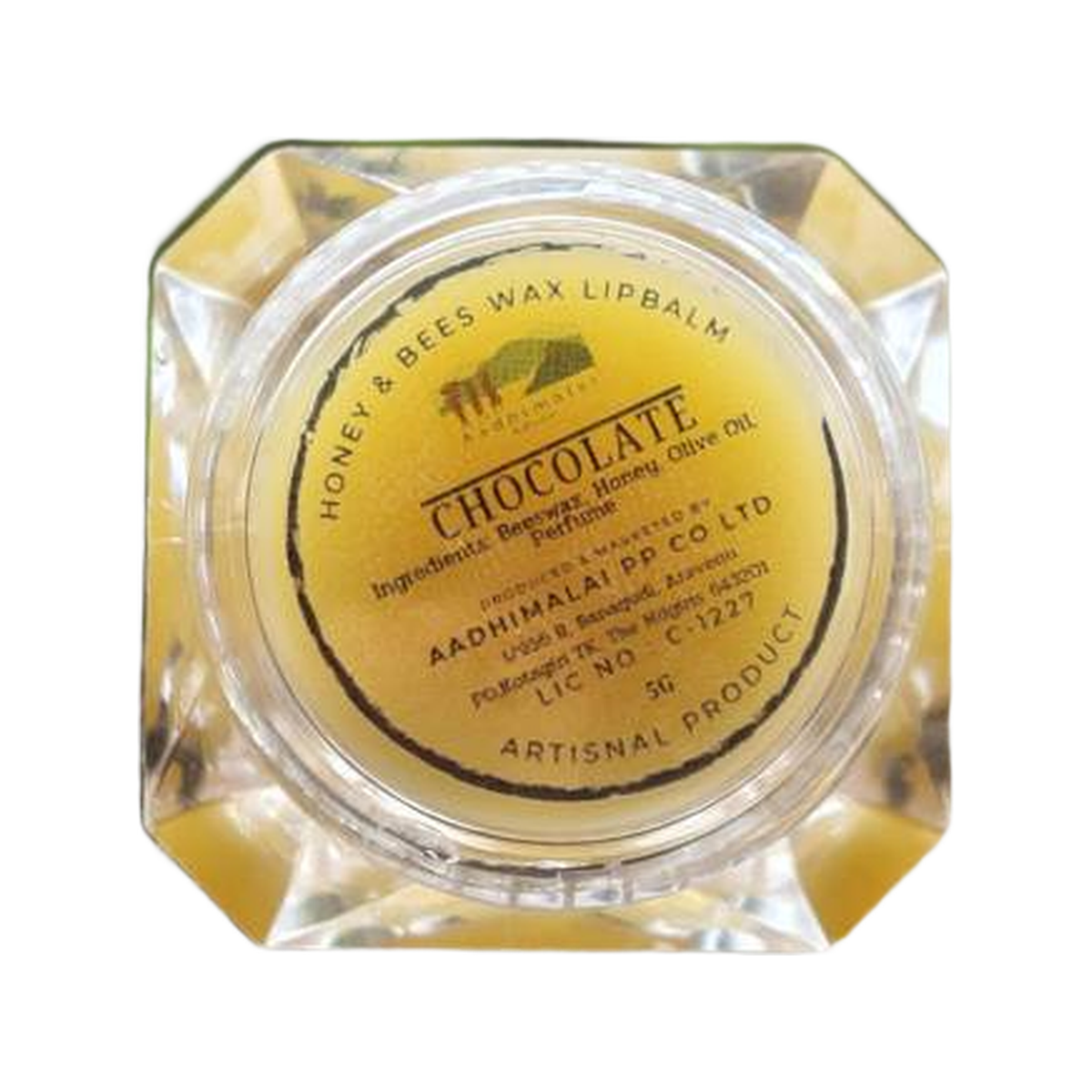 Aadhimalai Beeswax Lip Balm, chocolate, 5 g jar on a white background