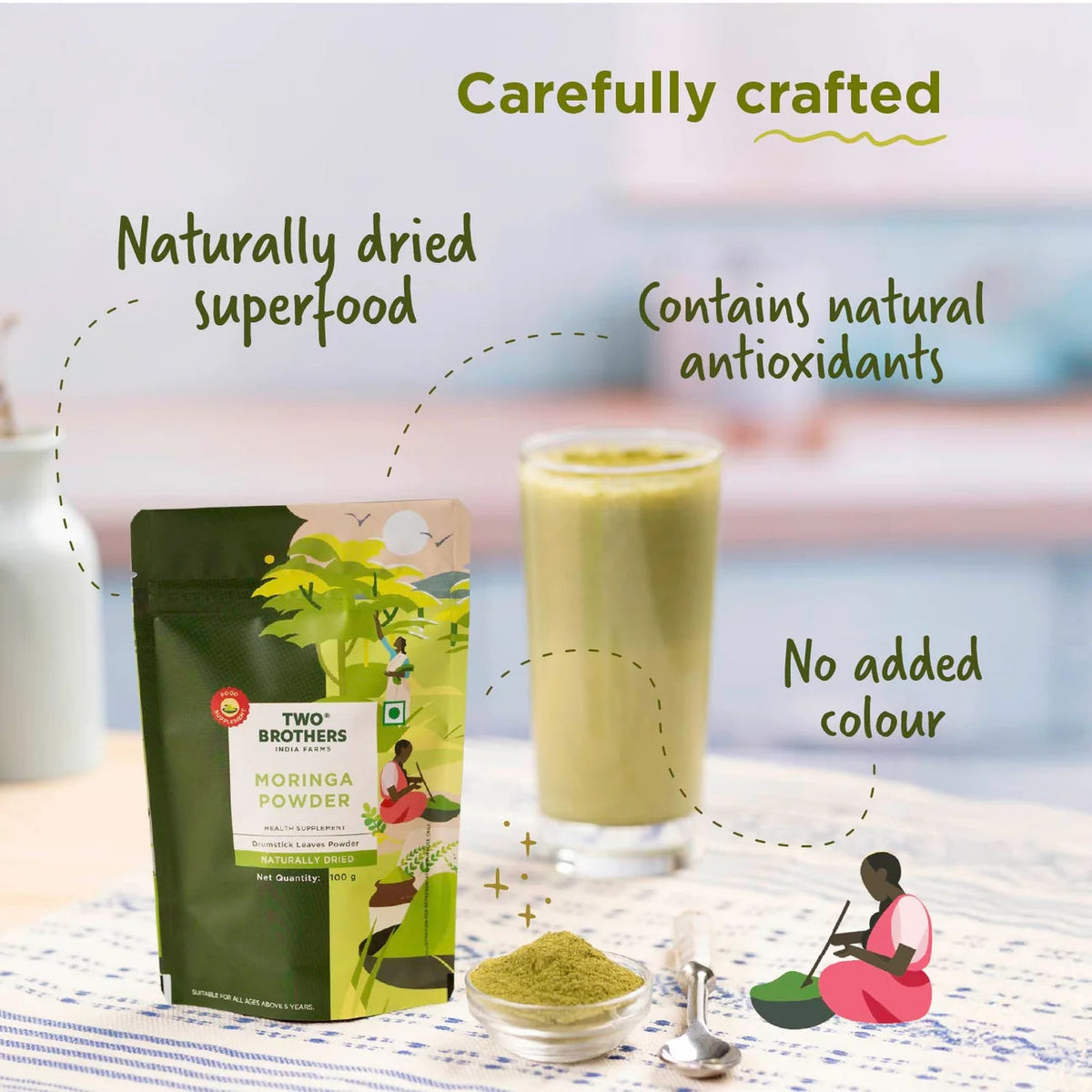 purepicked Moringa Powder pouch with a glass of green smoothie and a small bowl of fine green leaf powder