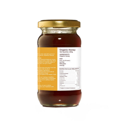 purepicked raw organic honey in a 250g glass jar with a white label showing nutritional information